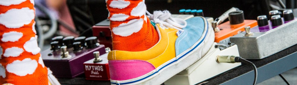 Dylan Miles and his guitar pedals at the Highlands Street Fair